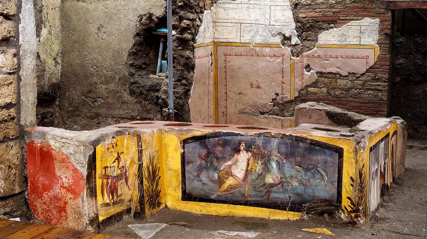 Wide view of the excavated Thermopolium of Regio V and its painted counter